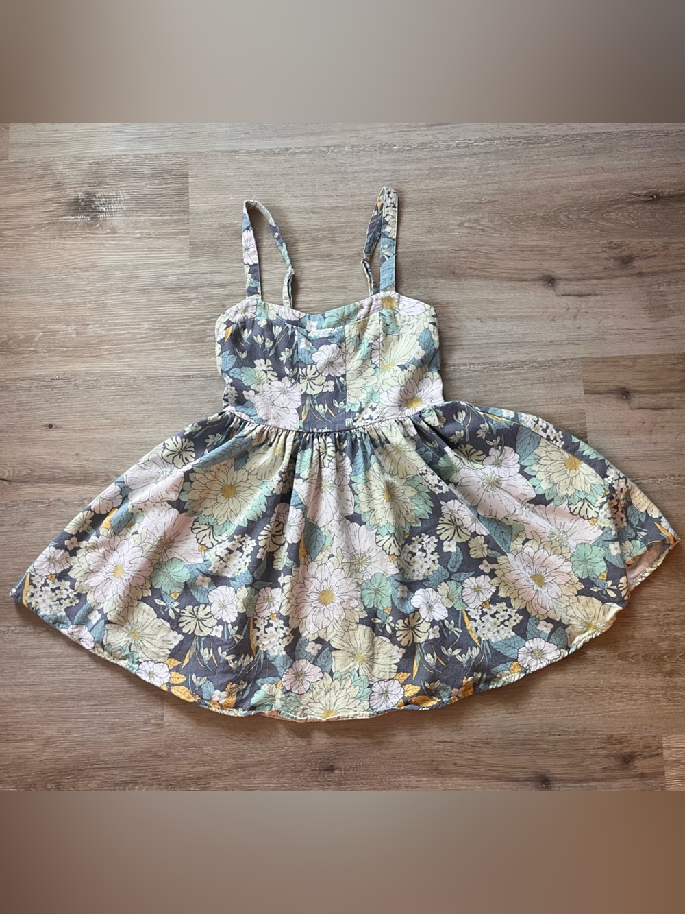 Floral sundress with adjustable straps and smocked back